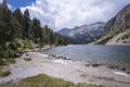 High mountain landscape with a lake and a beach in the foreground with mountains in the background, estany Llong in the national Royalty Free Stock Photo