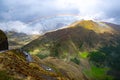 Rainbow over the majestic mountains of the alpine high road Timmelsjoch on way from Tyrol, Austria, to Merano in South Tyrol Italy Royalty Free Stock Photo