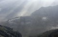 High mountains dawn with haze and sunbeams