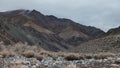 High mountains and many stones, high land and plants