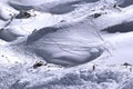 High mountains off-piste slopes for freeride with traces of skis and snowboards, sunny winter day, Caucasus Mountains, Elbrus Royalty Free Stock Photo