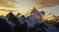 High mountains with sharp summits in snow at sunset with fluffy clouds in the sky. Royalty Free Stock Photo