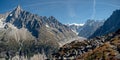 The high peaks of the chamonix valley and Mont Blanc Massif in the village of Chamonix in France. Royalty Free Stock Photo