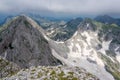 High peaks in limestone mountains in clouds