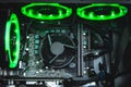 Computer circuit board and CPU cooling fans illuminated by internal LED Royalty Free Stock Photo