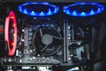 Computer circuit board and CPU cooling fans illuminated by internal LED Royalty Free Stock Photo