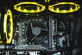Computer circuit board and CPU cooling fans illuminated by internal LED Royalty Free Stock Photo