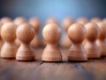 High-Performance Team Leadership illustrated by wooden figures showing a well-organized group, symbolizing a dynamic business team