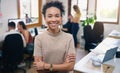 A high performing team makes a happy boss. Portrait of a confident young businesswoman working in a modern office with Royalty Free Stock Photo