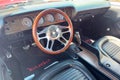 High perspective detail interior view of a 1970 Plymouth Hemi Cuda Hardtop Coupe at local car show.