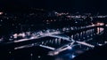 High perspective long exposure view of Zubizuri bridge at night in Bilbao, Spain - tilt shift effect