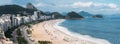 High perspective panoramic view of Copacabana Beach in Rio de Janeiro, Brazil with Sugarloaf mountain visible in the far Royalty Free Stock Photo