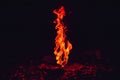 High pillar of fire coming out of the stone. Red fire burning flame Royalty Free Stock Photo