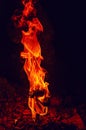 High pillar of fire coming out of the stone. Red fire burning flame Royalty Free Stock Photo
