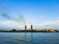 High pollution from power plant. Power plant on the coast. Ecology disaster concept. Royalty Free Stock Photo