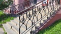High porch with decorative wrought iron railings Royalty Free Stock Photo