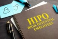 High-potential HIPO employees book. HR concept. Royalty Free Stock Photo