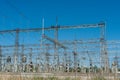 High power electricity poles in urban area. Energy electricity transmission, high voltage supply. Power Lines Royalty Free Stock Photo