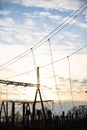 High-power electricity transmission station at sunset with an installed lightning protection system. Royalty Free Stock Photo