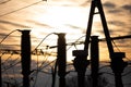 High-power electricity transmission station at sunset with an installed lightning protection system. Royalty Free Stock Photo