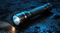 A high powered flashlight shines brightly on a dark background Royalty Free Stock Photo