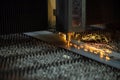 Cutting of metal. Sparks fly from laser