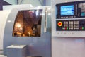 High precision CNC machining center working, operator machining automotive sample part process in factory