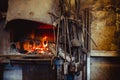 Fire in the furnace in the smithy, tools Royalty Free Stock Photo