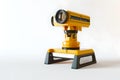 Professional yellow and black laser level tool isolated on white. perfect for construction and home improvement. modern