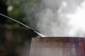 High pressure cleaning after Wine mixing and fermentation process in barrel, Bordeaux Vineyard