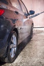 High pressure manual car washing Royalty Free Stock Photo