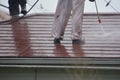 High-pressure washing of roof Royalty Free Stock Photo