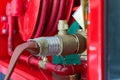 High pressure water pump valve with fire hose to cabinet Royalty Free Stock Photo