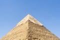 The high pyramid of Chephren on the background of a blue sky with clouds, Giza, Cairo, Egypt. second pyramid. Pyramid of Khafra. Royalty Free Stock Photo