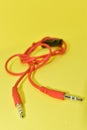 High-quality audio cable for display in yellow background Royalty Free Stock Photo