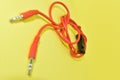 High-quality audio cable for display in yellow background Royalty Free Stock Photo