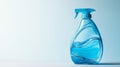 High-quality blue liquid detergent bottle with a spray nozzle on a clean white background with copy space for effective Royalty Free Stock Photo