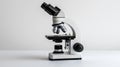 Modern laboratory microscope on a clean white background