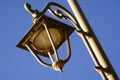 Old streetlight at blue sky