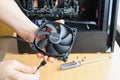 High -quality fan of cooling system of computer body in hands for installation, in hand