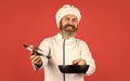 High quality frying pan. Bearded man cook white uniform. Homemade breakfast. Cooking like pro. Easy tasty meal prepared Royalty Free Stock Photo