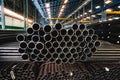 High quality Galvanized steel pipe or Aluminum and chrome stainless pipes in stack waiting for shipment in warehouse Royalty Free Stock Photo