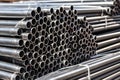 high quality Galvanized steel pipe or Aluminum and chrome stainless pipes in stack waiting for shipment in warehouse