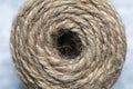 High-quality handmade coil made of natural hemp rope, isolated on a white background Royalty Free Stock Photo