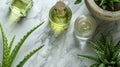 aloe vera plant and essential oil bottle on marble table promoting botanical skincare and health, showcasing natural