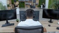 Focused Programmer Coding in Modern Office High-Quality Image Showcasing Back View of Software Developer Working on Laptop with