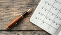 High quality image featuring a calendar page, pen, and a convenient pocket planner Royalty Free Stock Photo