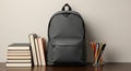 Gray Backpack, Books, Pencils Back to School Supplies Mockup Royalty Free Stock Photo