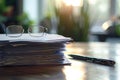 High Quality Image of Stack of Documents, Eyeglasses, and Pen on Office Table Royalty Free Stock Photo