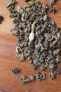 High quality jasmine green tea at wooden desk. macro shot Royalty Free Stock Photo